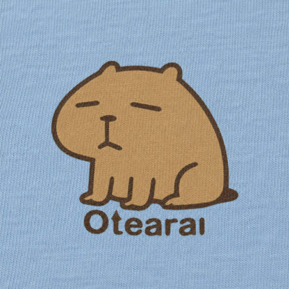 カピバラ「Otearai」 キッズTシャツ ペールグリーン プリント接写・天竺生地の質感