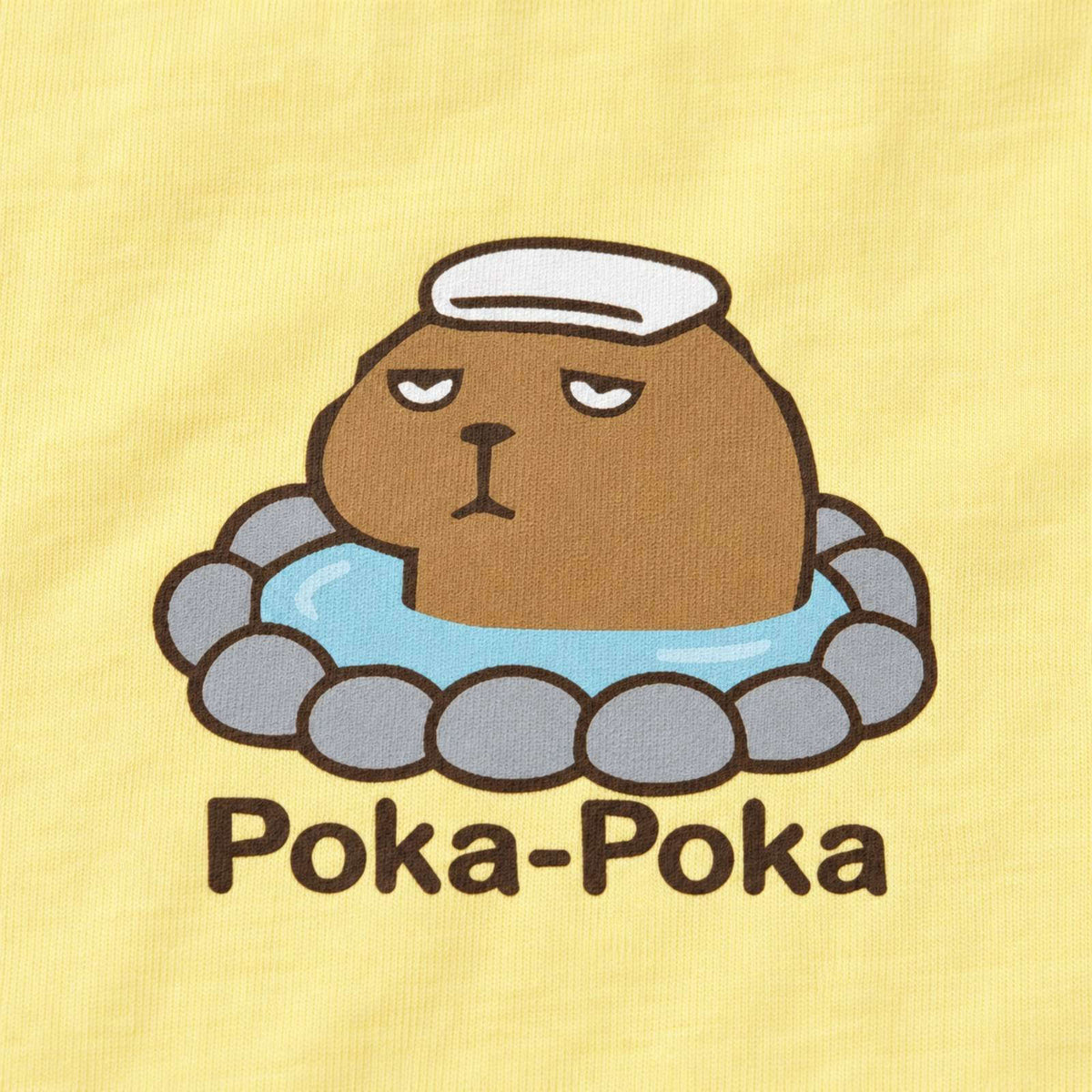 カピバラ「Poka-Poka」 キッズTシャツ ライトイエロー プリント接写・天竺生地の質感