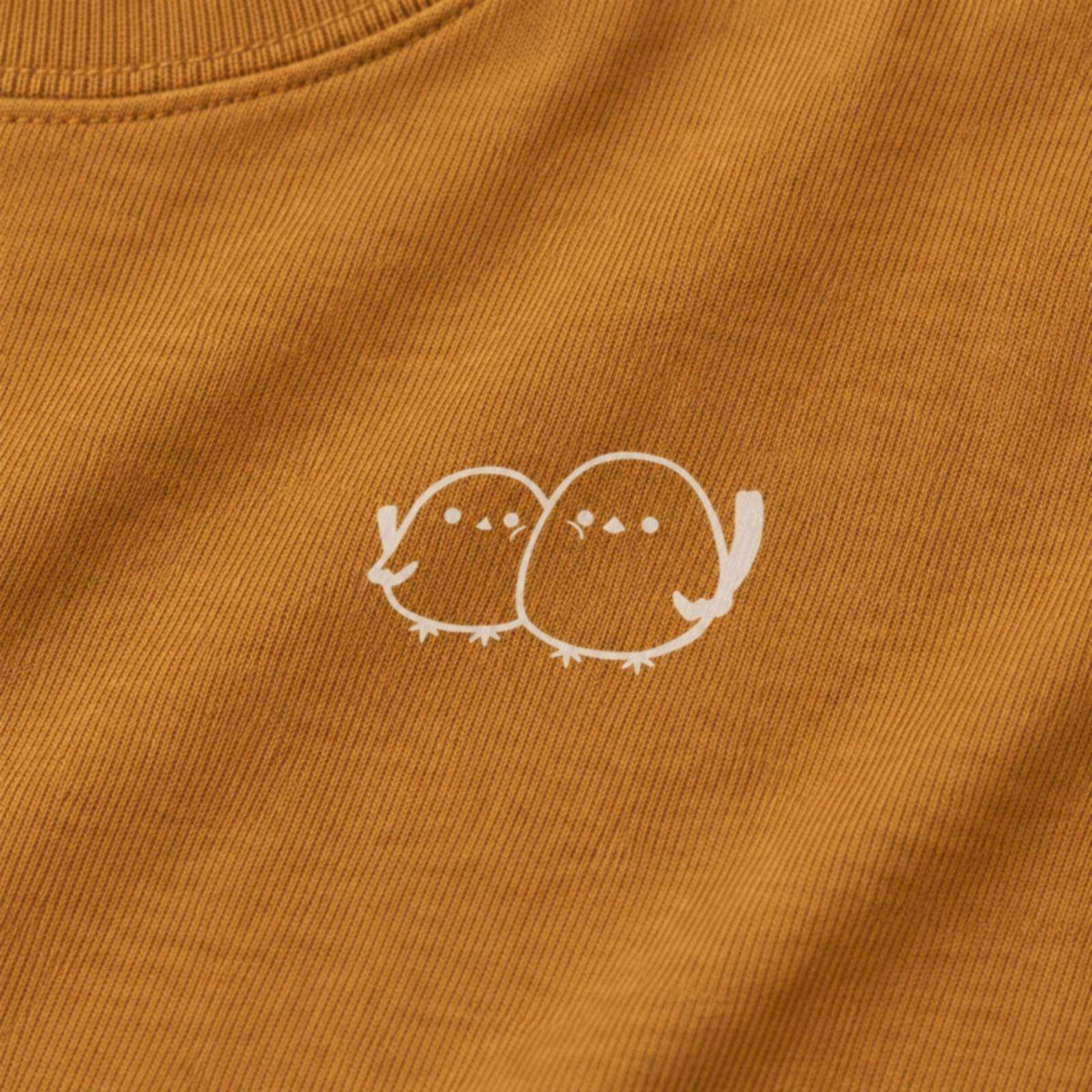 しまえなが ユニセックス袖リブ長袖Tシャツ キャメル プリント接写・上質天竺の質感